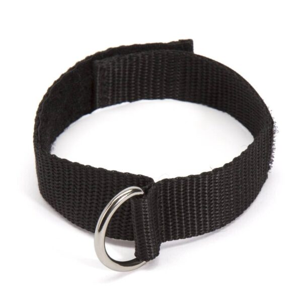 "Adjustable black wrist restraints with a metal connector clip, shown on hands with manicured nails."